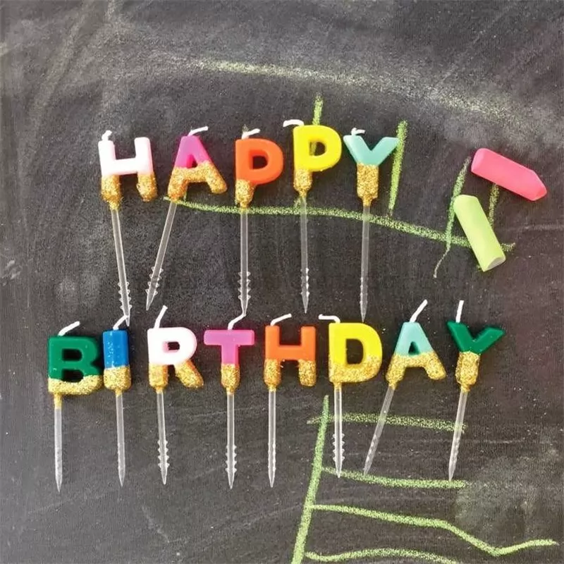 Dust and decorate letter birthday candles