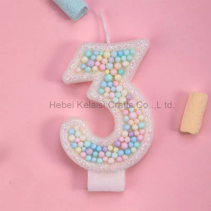 Macaron colored candy particles decorated birthday candles