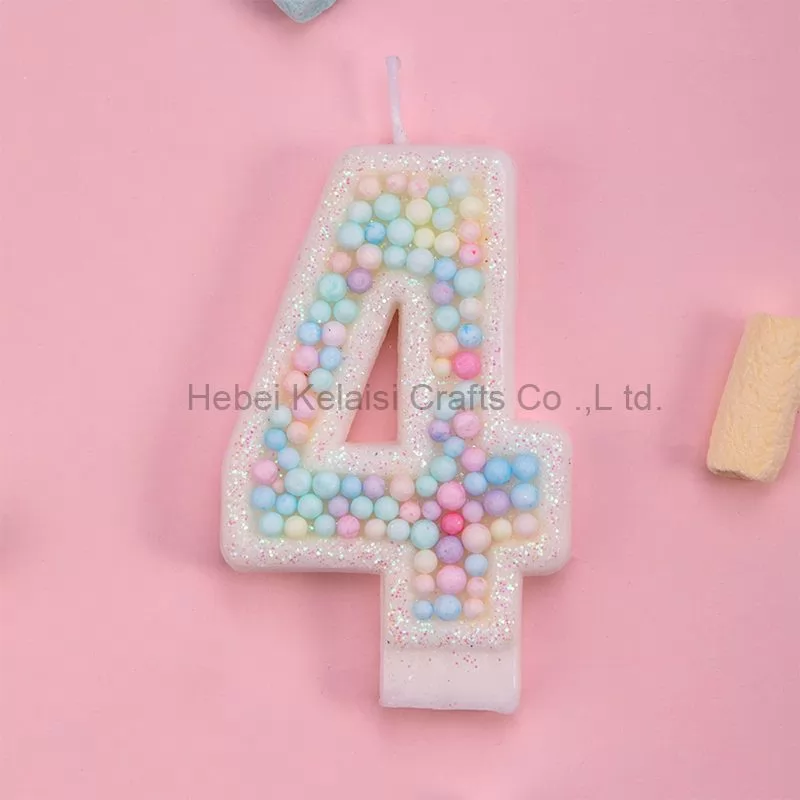 Macaron colored candy particles decorated birthday candles