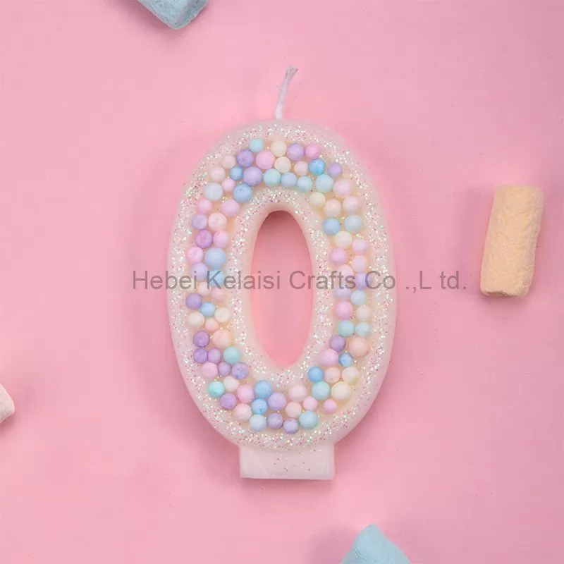 Macaron colored candy particles decorated birthday candles