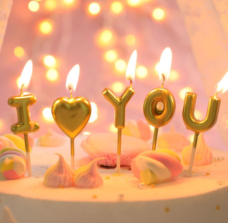 Gold i love you shape letter candle