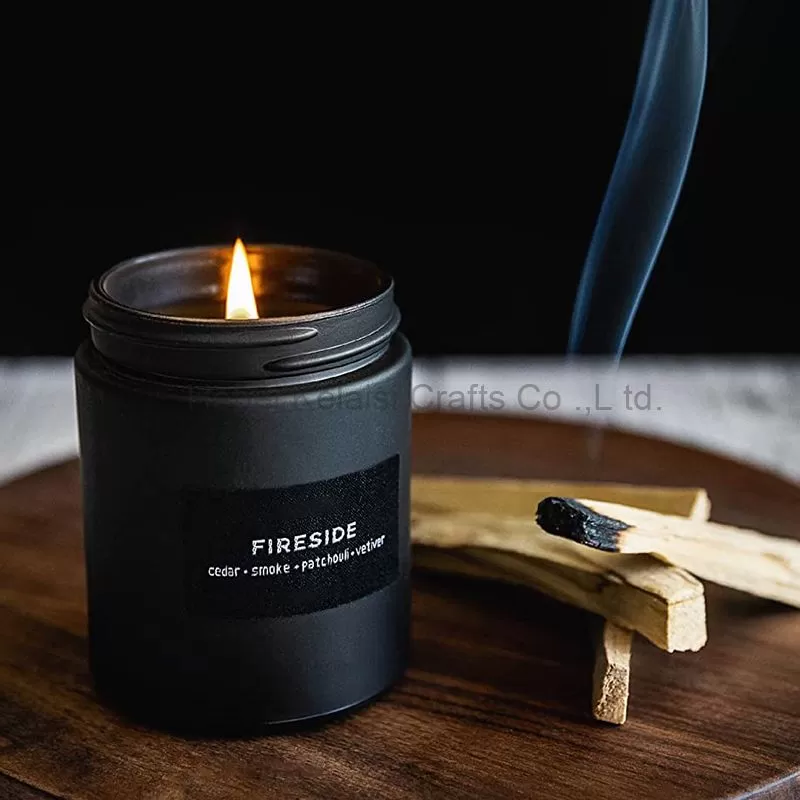 Relaxing aromatherapy candle in black glass jar scented candle