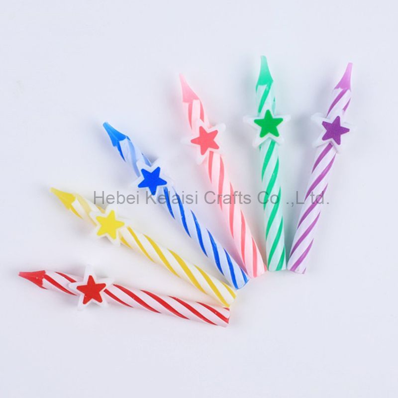 Colorful Stars birthday cake decorated with candles