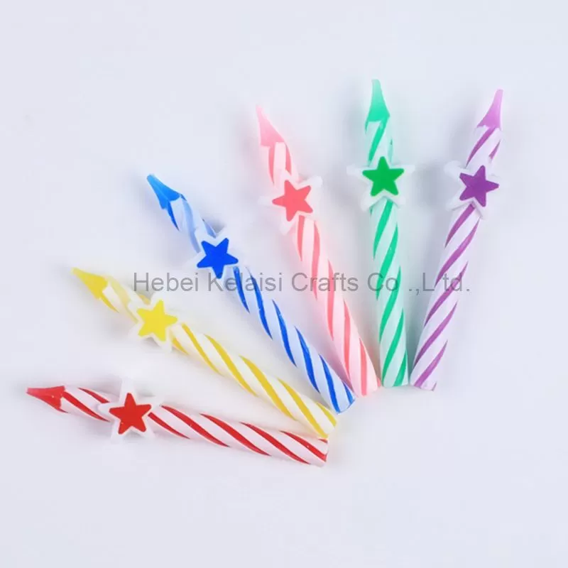 Colorful Stars birthday cake decorated with candles