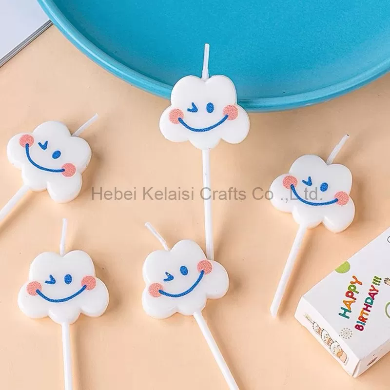 Clouds smiling birthday cake candle